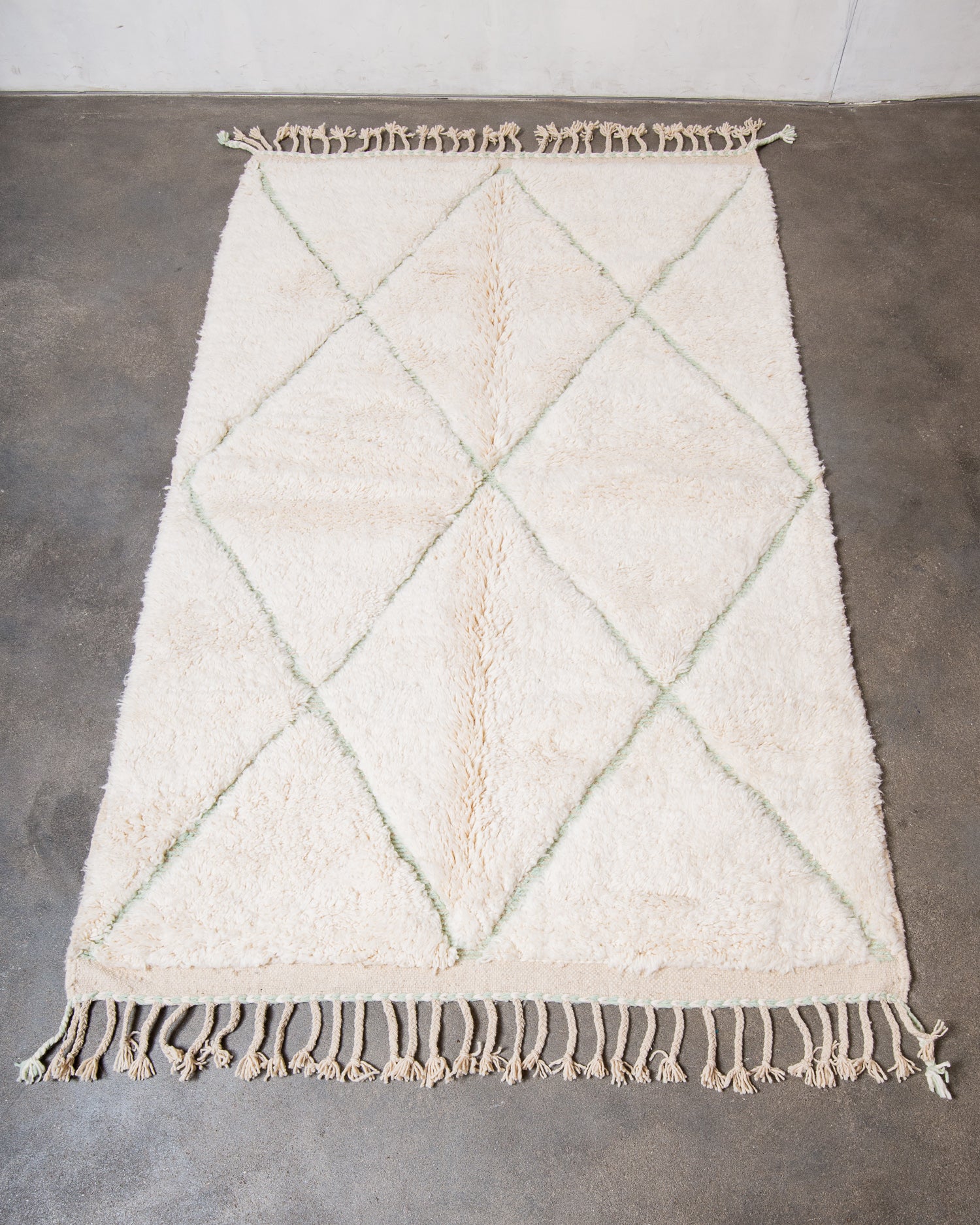 Modern, designer, handcrafted Berber rug from Morocco. Beniourain carpet with beautiful colours and patterns and fluffy wool texture.